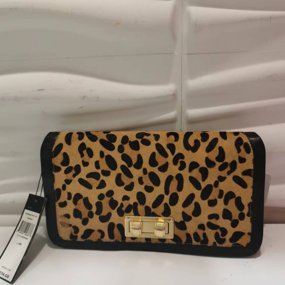 BCBG Brand New with tag clutch